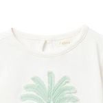 Blusa-blanca-con-estampado-para-niña-104831976