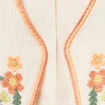 Chaleco-beige-bordado-para-niña-104831813