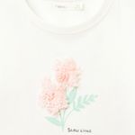Blusa-blanca-con-textura-para-niña-104831996
