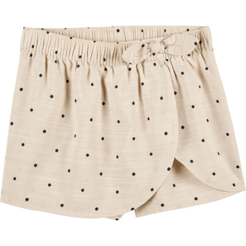 Falda-short-beige-con-puntos-para-niña-104840843
