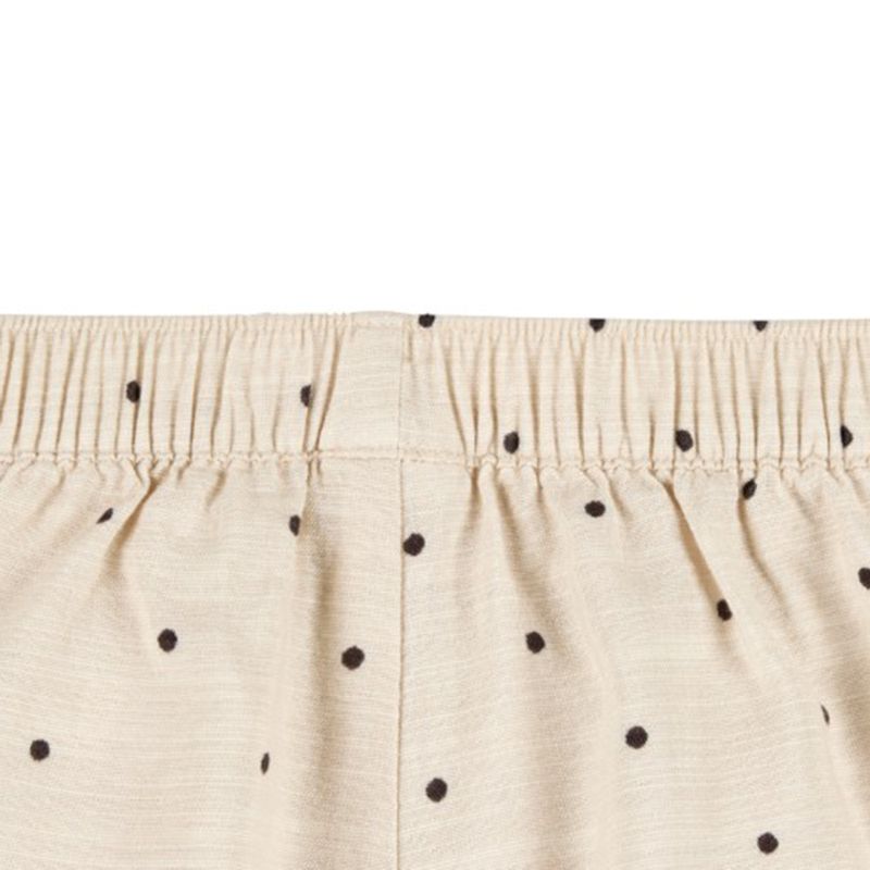 Falda-short-beige-con-puntos-para-niña-104840843