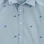 Camisa-gris-con-estampado-de-dinosaurios-para-niño-104840852
