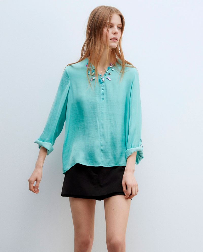 104832427-Blusa-Sfera-casual-celeste-manga-larga-para-mujer
