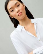 104834317-Blusa-Easy-Wear-camisera-blanca-manga-larga-para-mujer