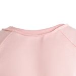 Blusa-rosada-con-estampado-para-niña-104793596