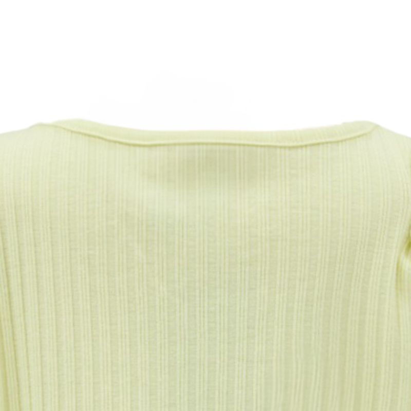 Blusa-amarilla-con-acanalado-para-niña-104785771