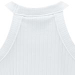 Blusa-blanca-con-acanalado-para-niña-104785759