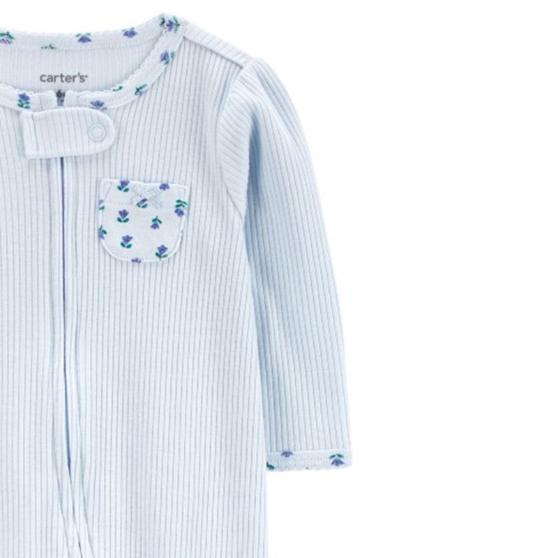 Pijama-celeste-bolsillo-estampado-para-bebe-niña-104846099