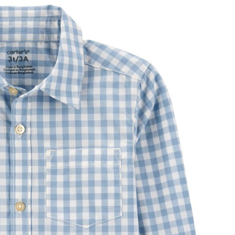 Camisa-bicolor-con-cuadros-para-niño-104846810
