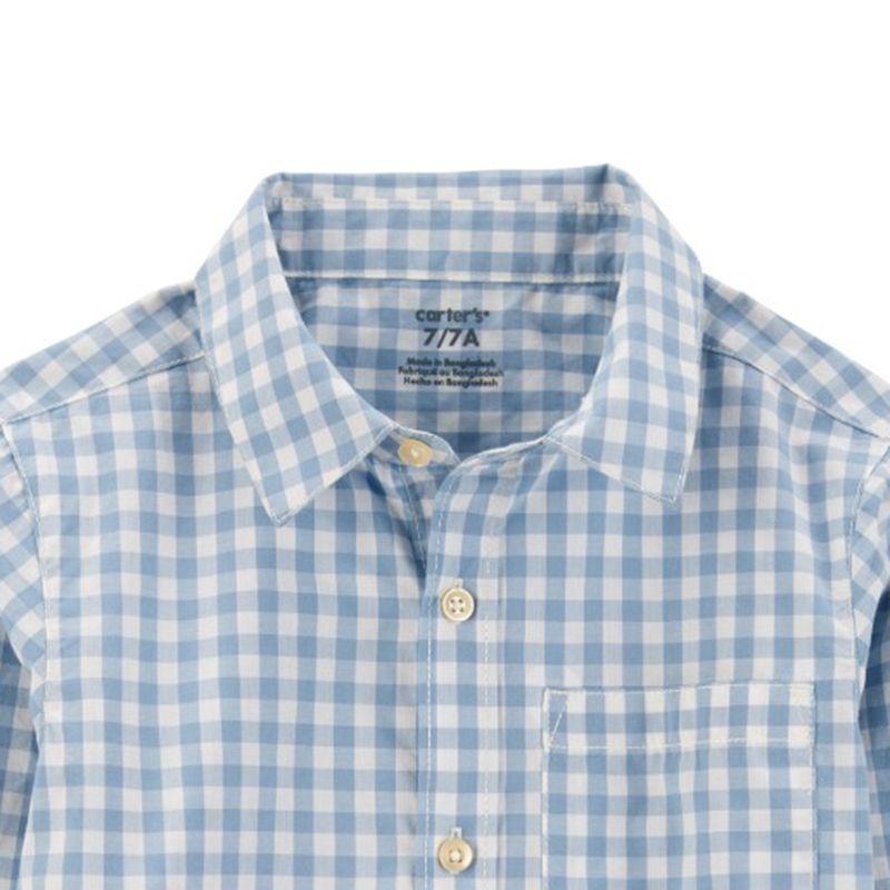 Camisa-bicolor-con-cuadros-para-niño-104846953