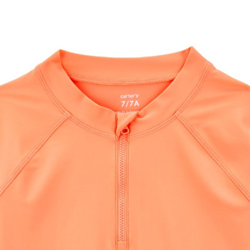 Camiseta-anaranjada-solido-para-niño-104846978