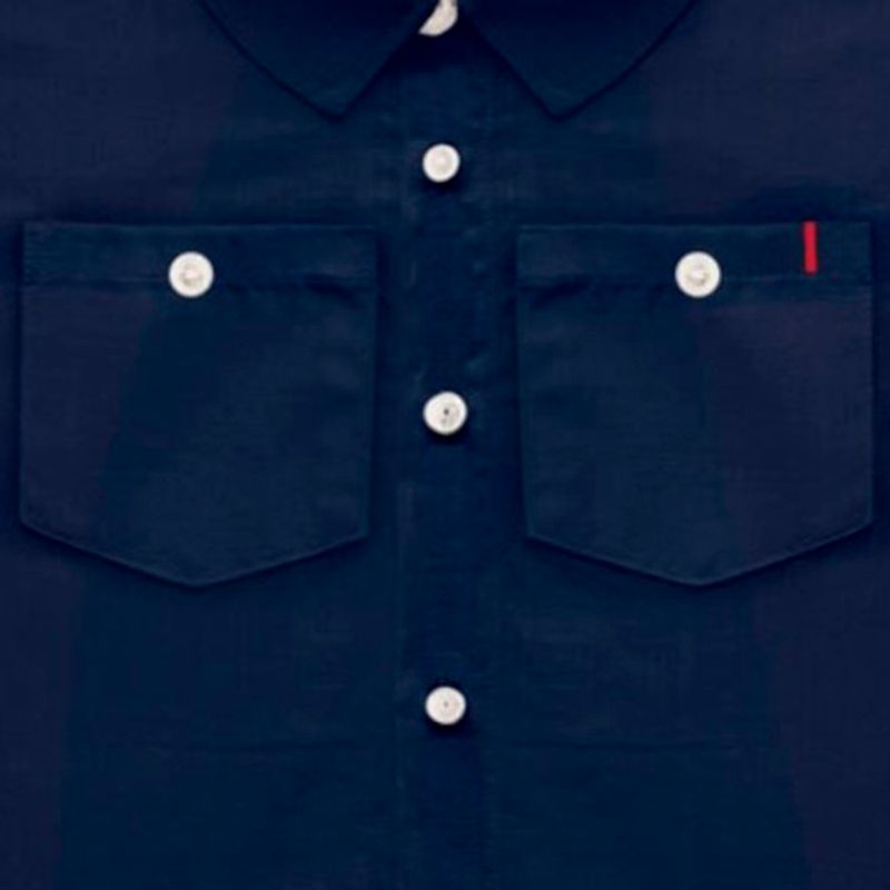 Camisa-azul-solido-para-niño-104810056