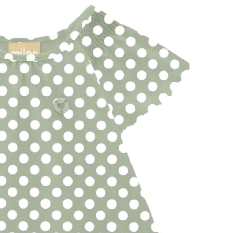 Vestido-verde-con-puntos-para-niña-104824093
