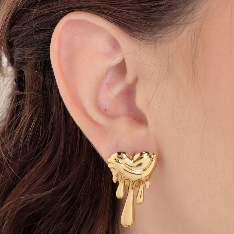 104859382-Aretes-de-acero-inoxidable-dorados-para-mujer