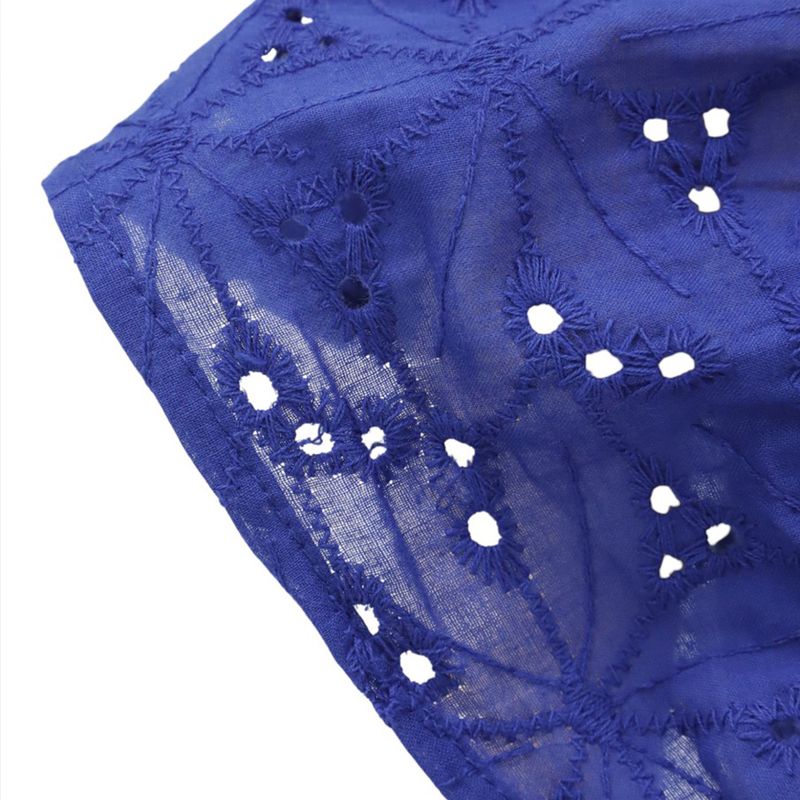 Vestido-azul-calado-para-niña-104730324