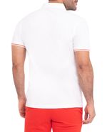 104844478-Camisa-polo-Oscar-de-la-Renta-blanca-solida-para-hombre