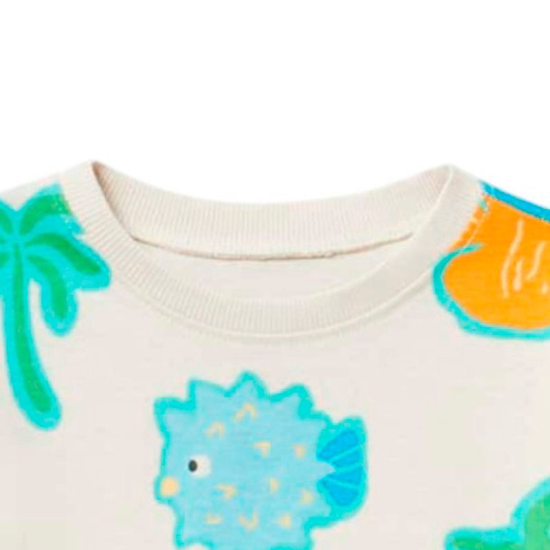 Blusa-beige-con-estampado-para-bebe-niña-104870945