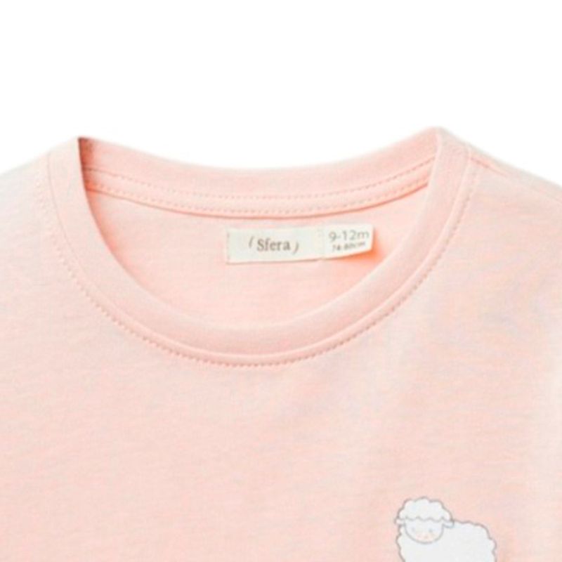 Blusa-rosada-con-estampado-para-bebe-niña-104870885
