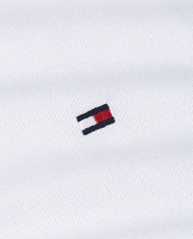 104842100-Camisa-polo-regular-fit-Tommy-Hilfiger-blanca-solida-para-hombre