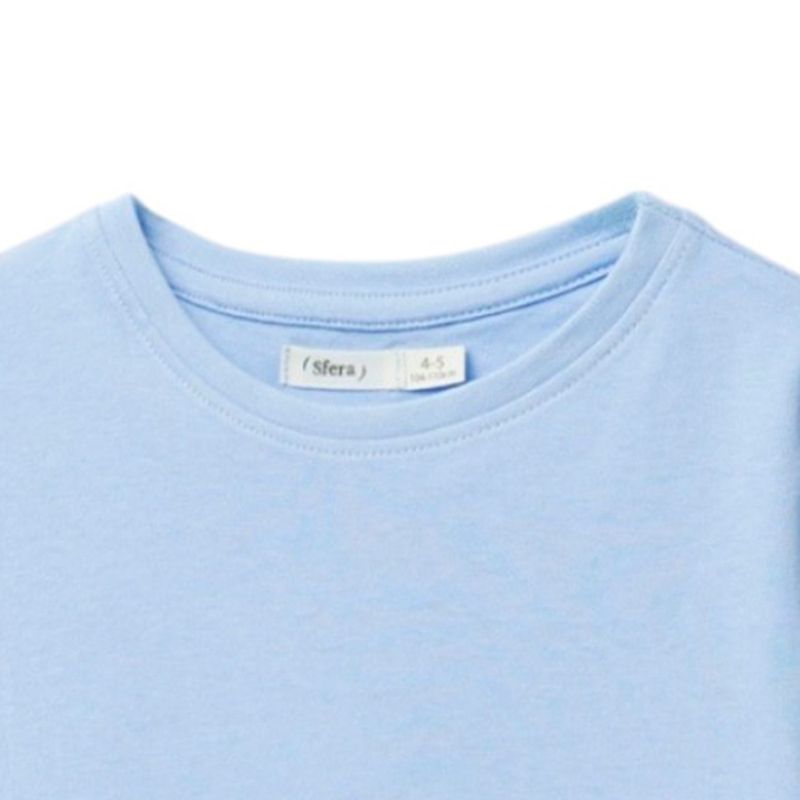 Blusa-azul-solido-para-niña-104872087