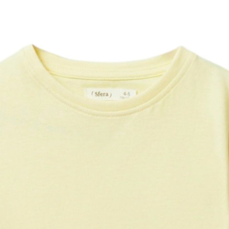 Blusa-amarilla-solido-para-niña-104872118