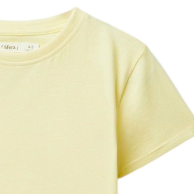 Blusa-amarilla-solido-para-niña-104872118