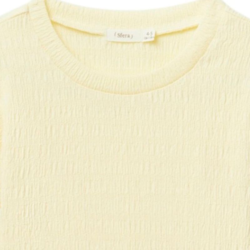Blusa-amarilla-solido-para-niña-104872150