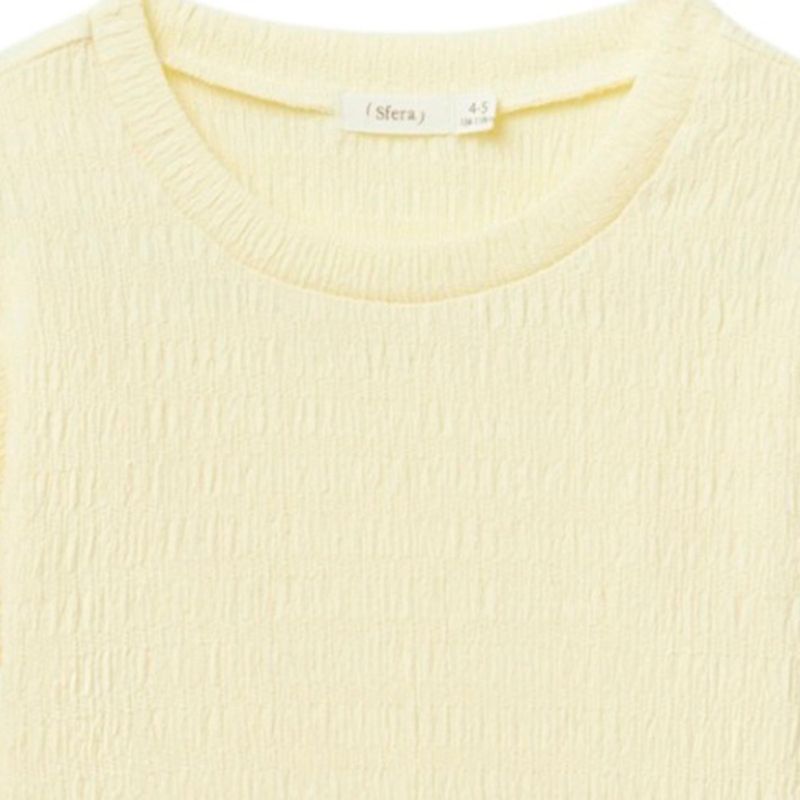 Blusa-amarilla-solido-para-niña-104872153