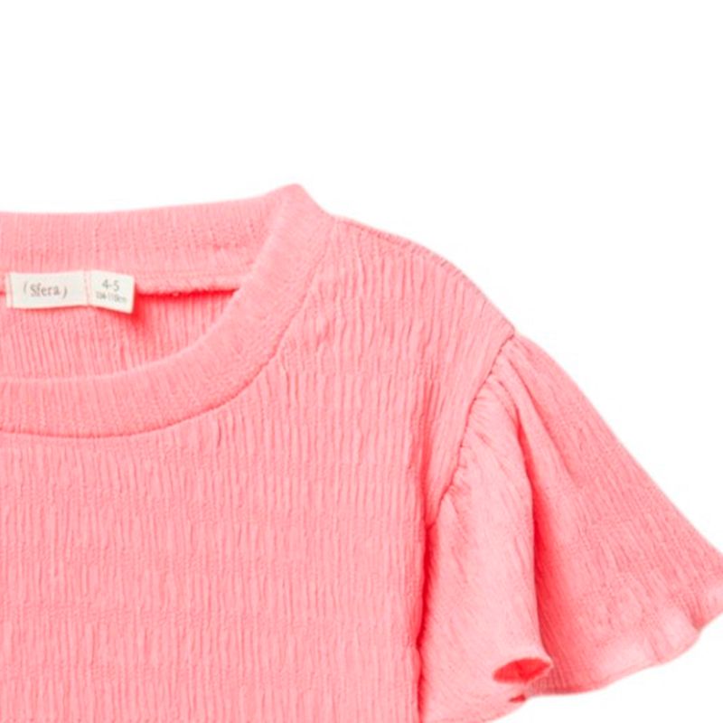 Blusa-rosada-solido-para-niña-104872160