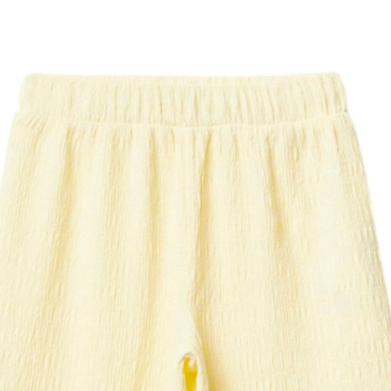 Pantalon-amarillo-solido-para-niña-104872190