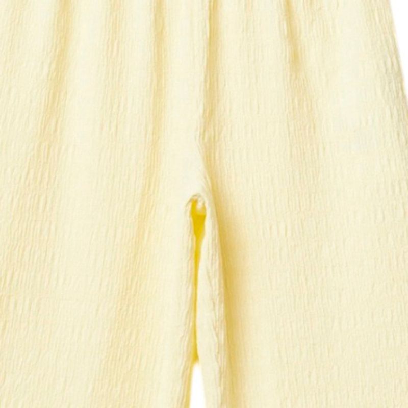 Pantalon-amarillo-solido-para-niña-104872190
