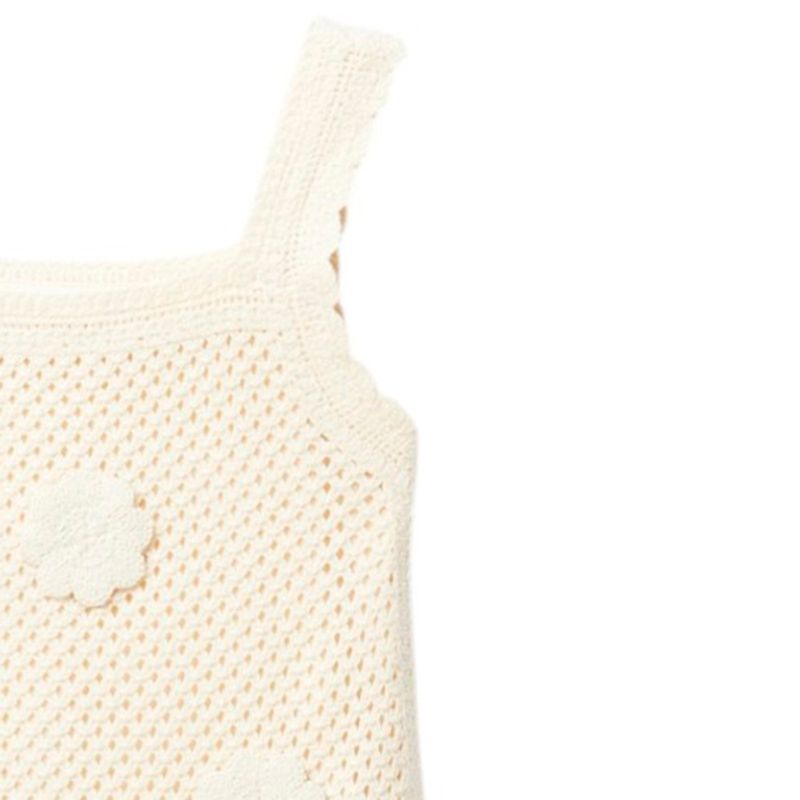 Vestido-beige-con-crochet-para-niña-104872243