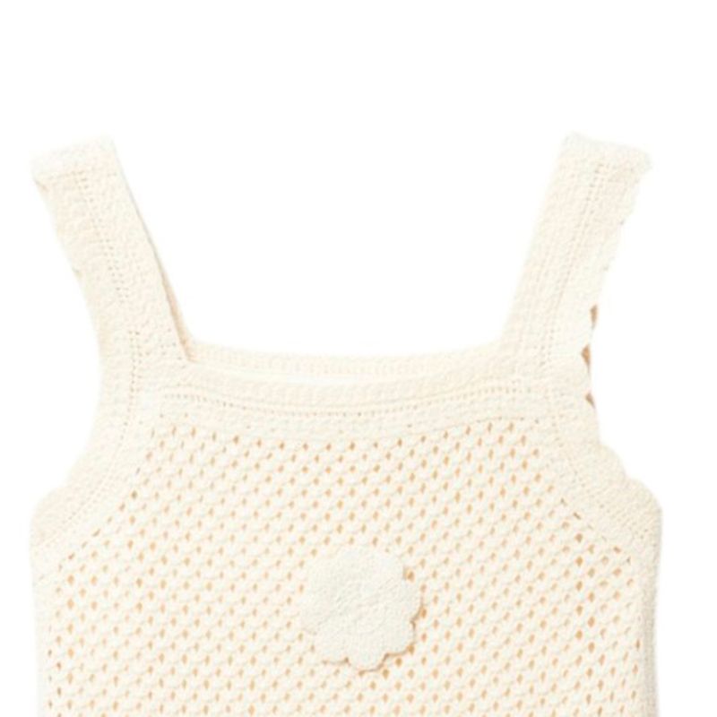 Vestido-beige-con-crochet-para-niña-104872246