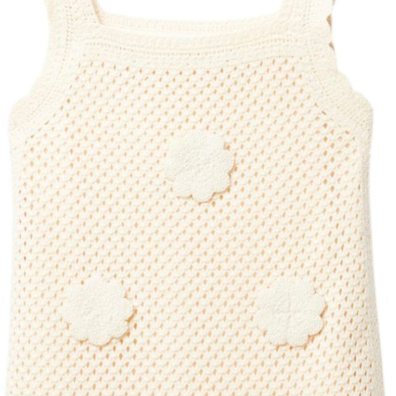 Vestido-beige-con-crochet-para-niña-104872246