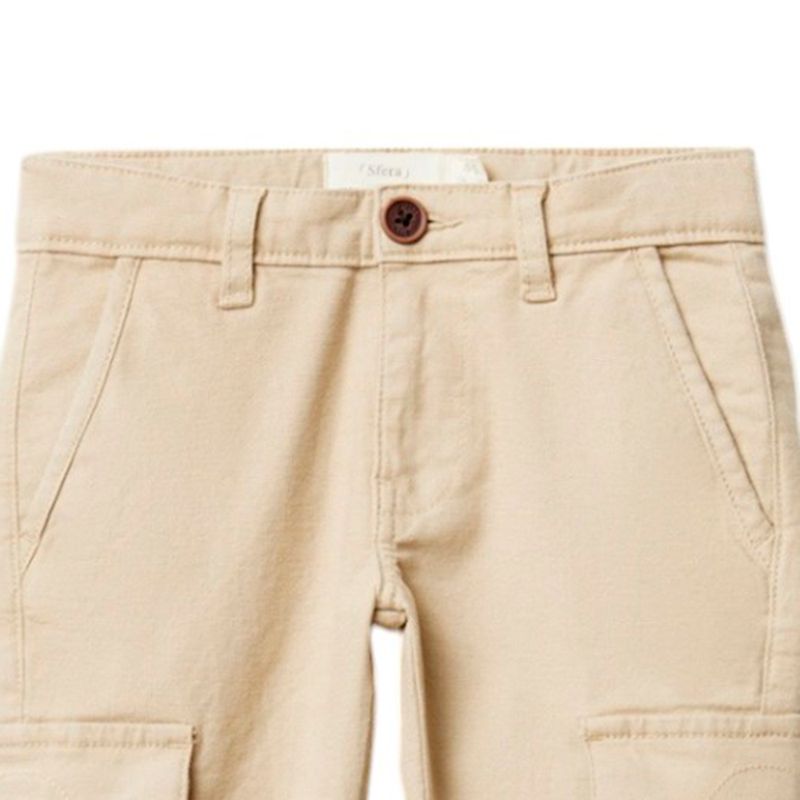 Pantalon-beige-solido-para-niño-104874717