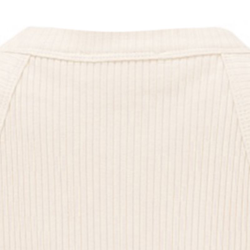 Blusa-blanca-con-acanalado-para-niña-104743544