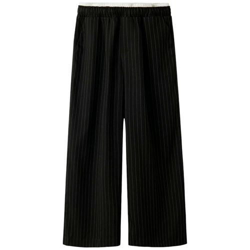 Pantalón negro a rayas para niña