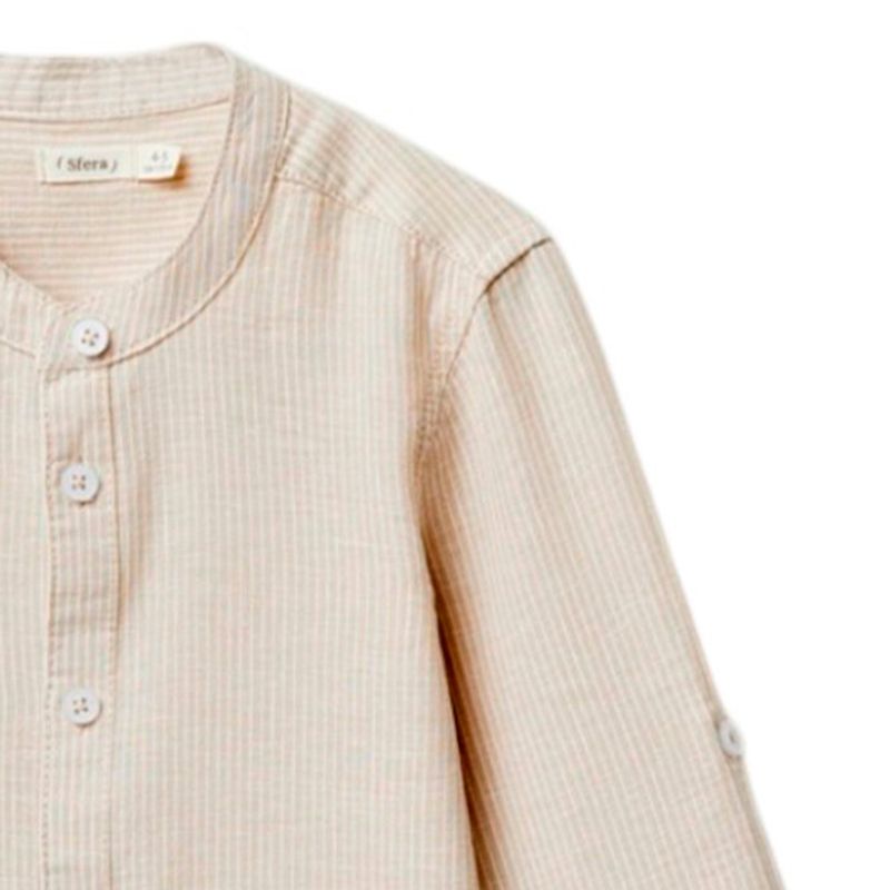 Camisa-bicolor-a-rayas-para-niño-104874809