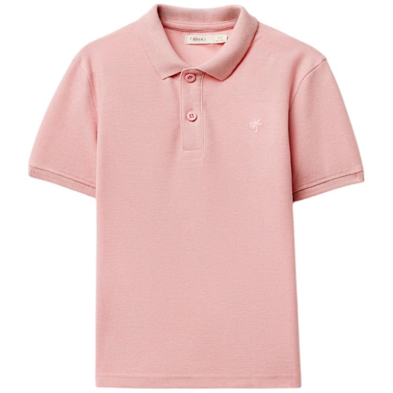 Camisa-polo-rosada-solido-para-niño-104874911