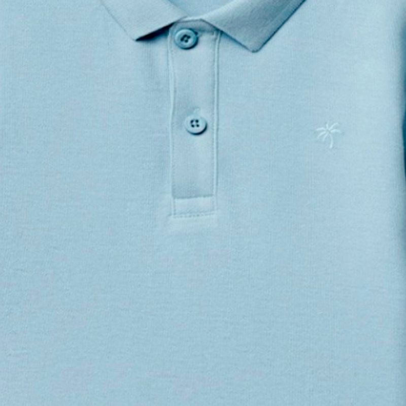 Camisa-polo-celeste-solido-para-niño-104874922