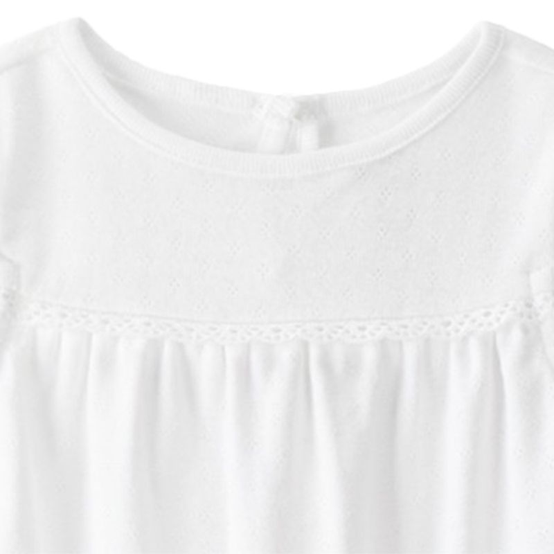 Mameluco-blanco-calado-para-bebe-niña-104882679