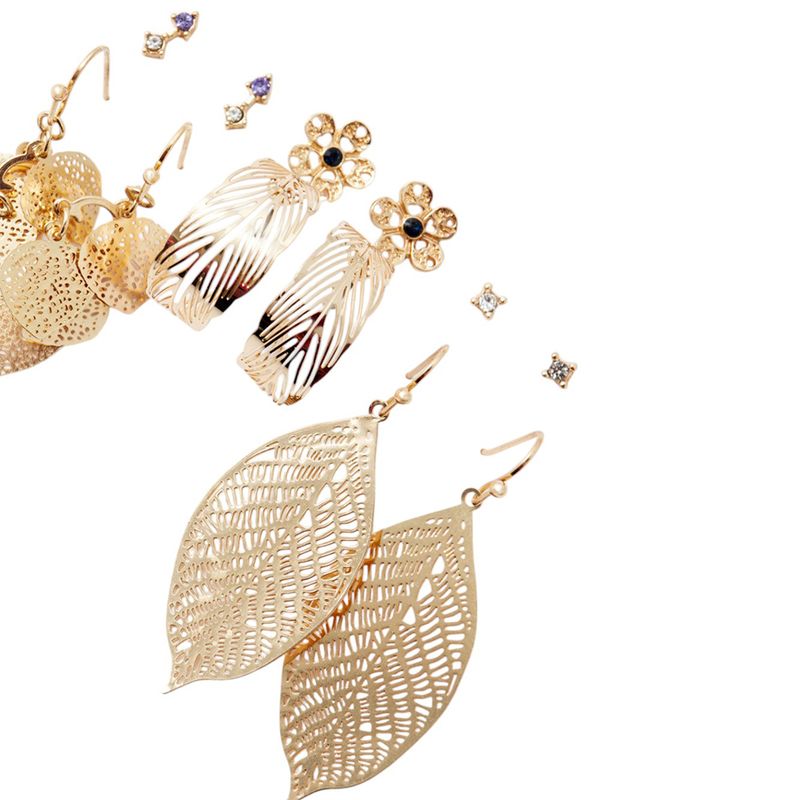 104874037-Set-de-6-pares-de-aretes-dorados-para-mujer
