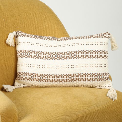 Cojín decorativo con pom pom 30x50cm