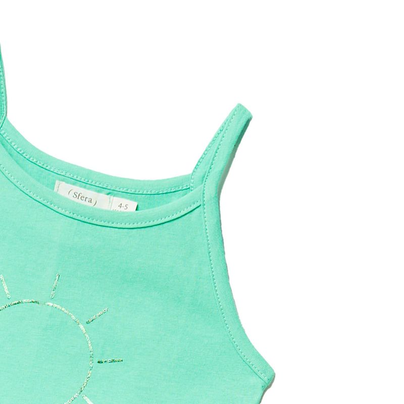 104669977-Blusa-verde-con-estampado-de-sol-para-niña