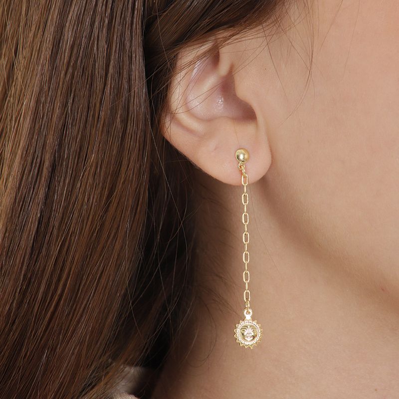 104886389-Aretes-largos-en-enchape-de-oro-22k-para-mujer