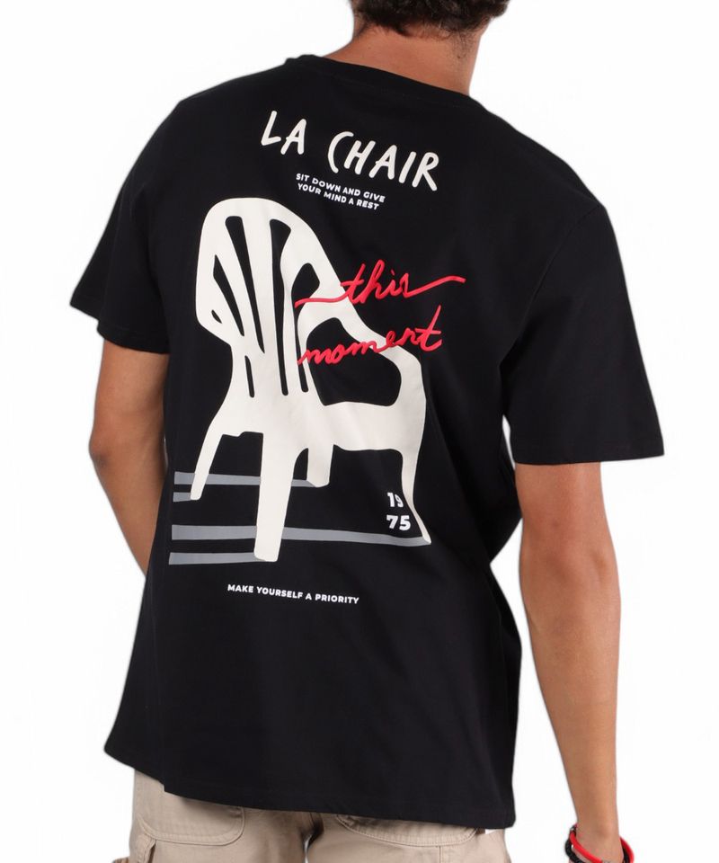 104765630-Camiseta-Orange-regular-fit-negra-con-estampado--La-Chair--para-hombre