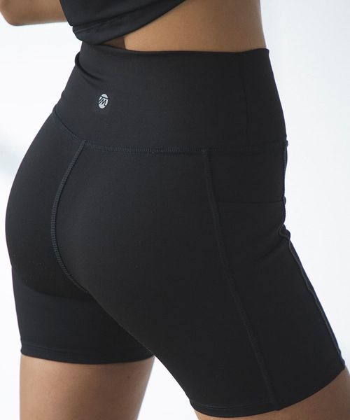 Short deportivo Teammate negro sólido para mujer