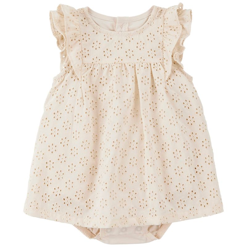 104893357-Vestido-beige-con-textura-calada-para-bebe-niña