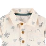 104893396-Romper-beige-con-estampado-para-bebe-niño