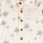 104893396-Romper-beige-con-estampado-para-bebe-niño